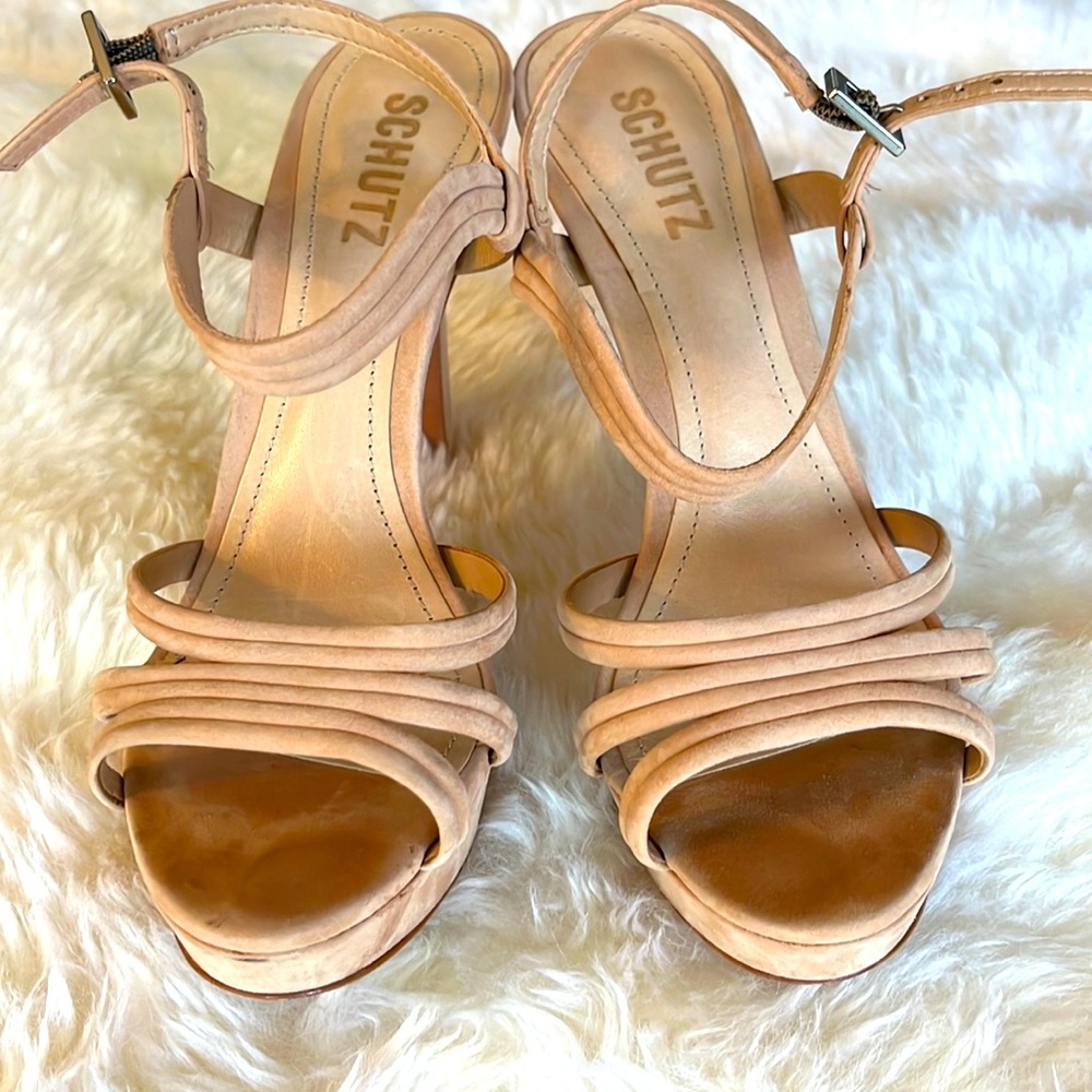 Blush/light camel platform heels.